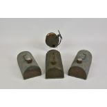 Three copper foot warmers, two 9in. long and one 8 5/8 in. long; together with a vintage Malloch's