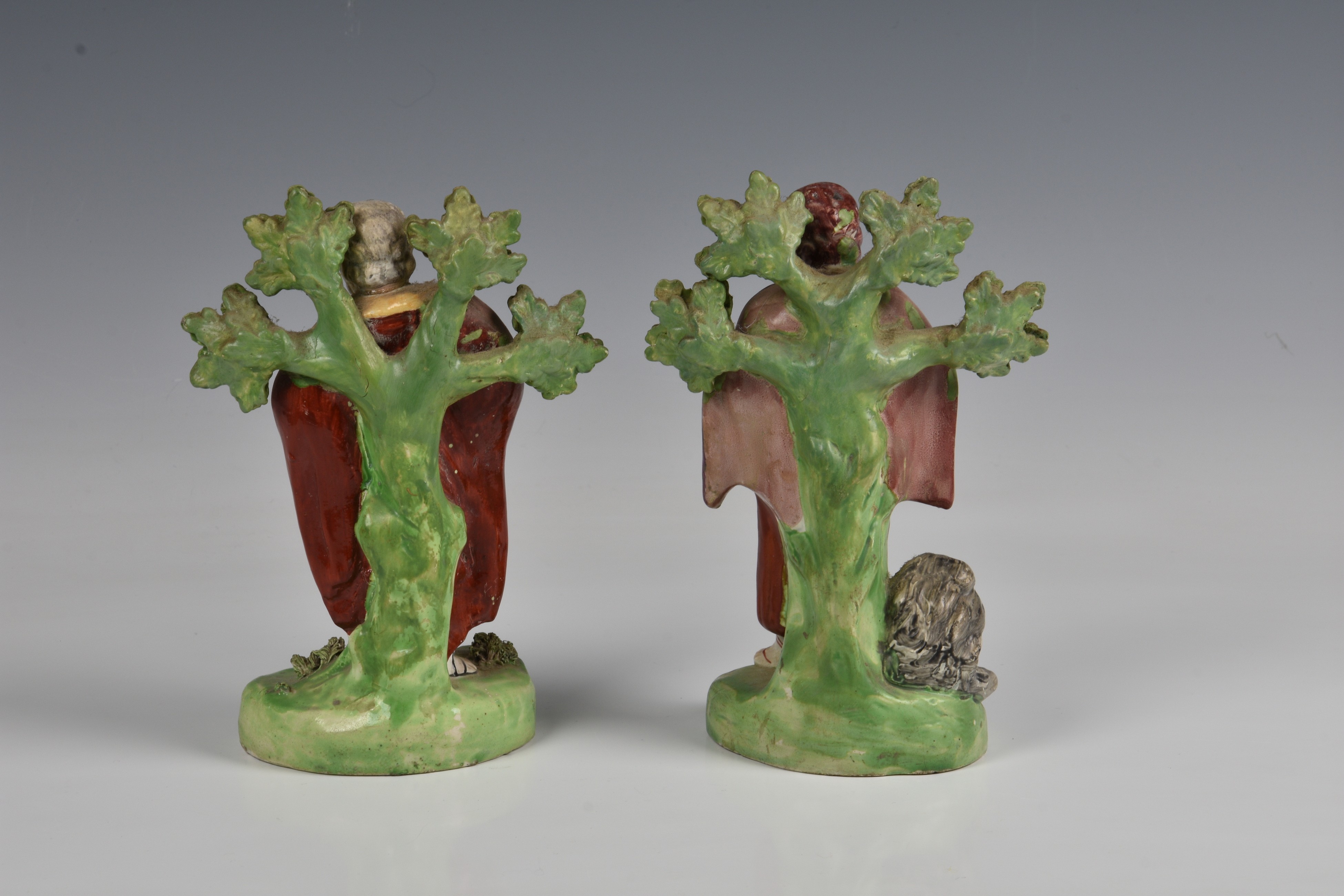 Two Staffordshire 19th century pottery figures of saints, to include 'ST.MARK', standing in front of - Image 2 of 2