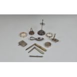 A small collection of collectable silver, to include a novelty wishbone place card holder by Marks &