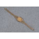 A 1918 gold sovereign in a 9ct gold bracelet mount,