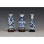 Three Chinese porcelain blue and white vases, 20th century, comprising a baluster vase with six