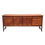 A 1960s 'Circles' teak sideboard by Nathan Furniture, Model 1024, designed by Patrick Lee, maker's