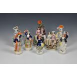 A collection of 19th century Staffordshire figural groups, of couples and dancers, of varying