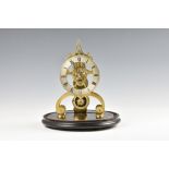 A 19th century brass single fusee skeleton clock, with single spire to the joined scroll frame and