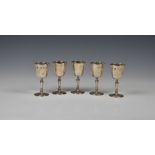 A set of five Elizabeth II silver goblets, C. J. Vander Ltd., London 1975, the bell shaped bowls
