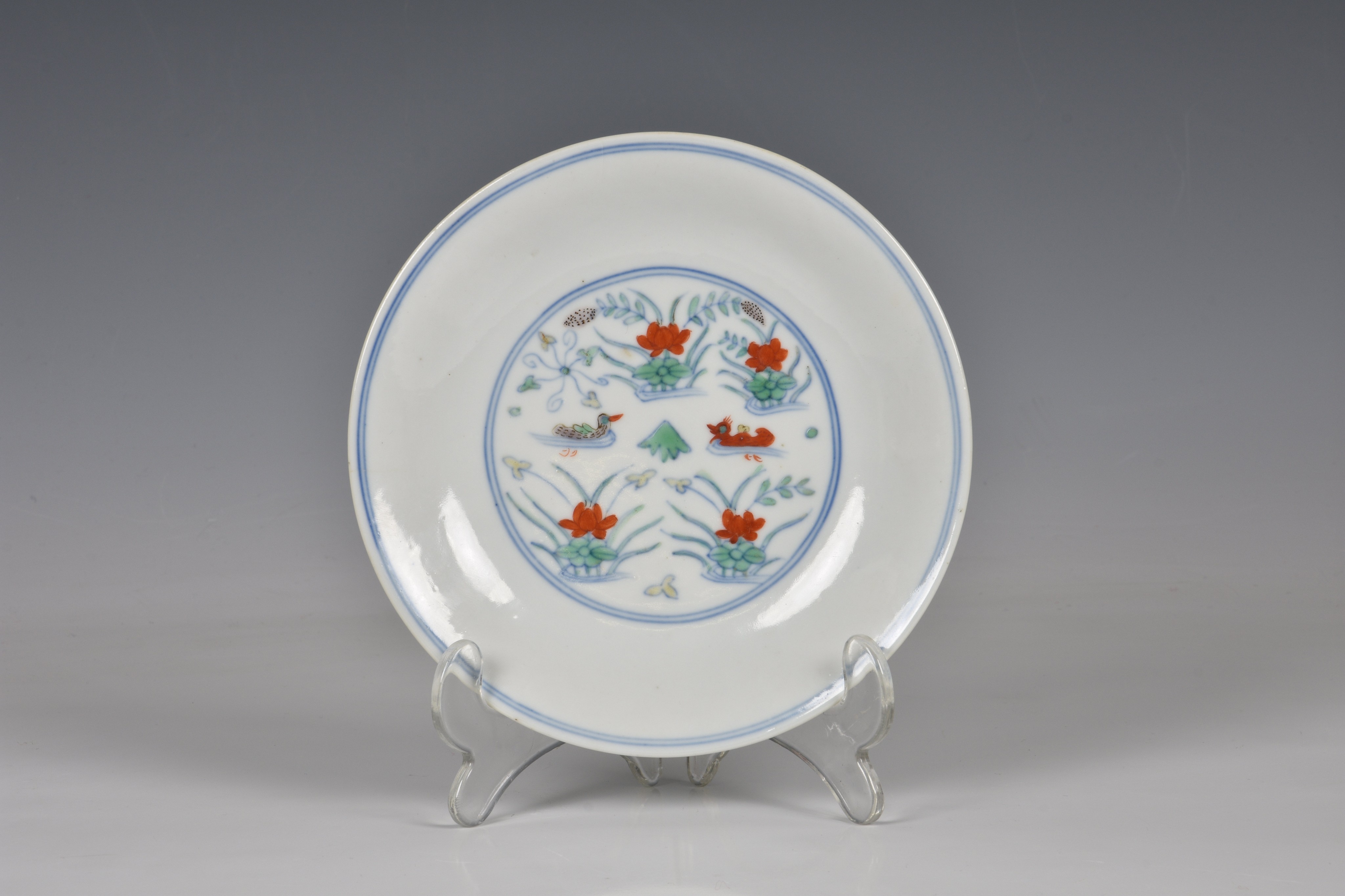 A Chinese doucai 'duck and lotus pond' porcelain dish, four character mark within double