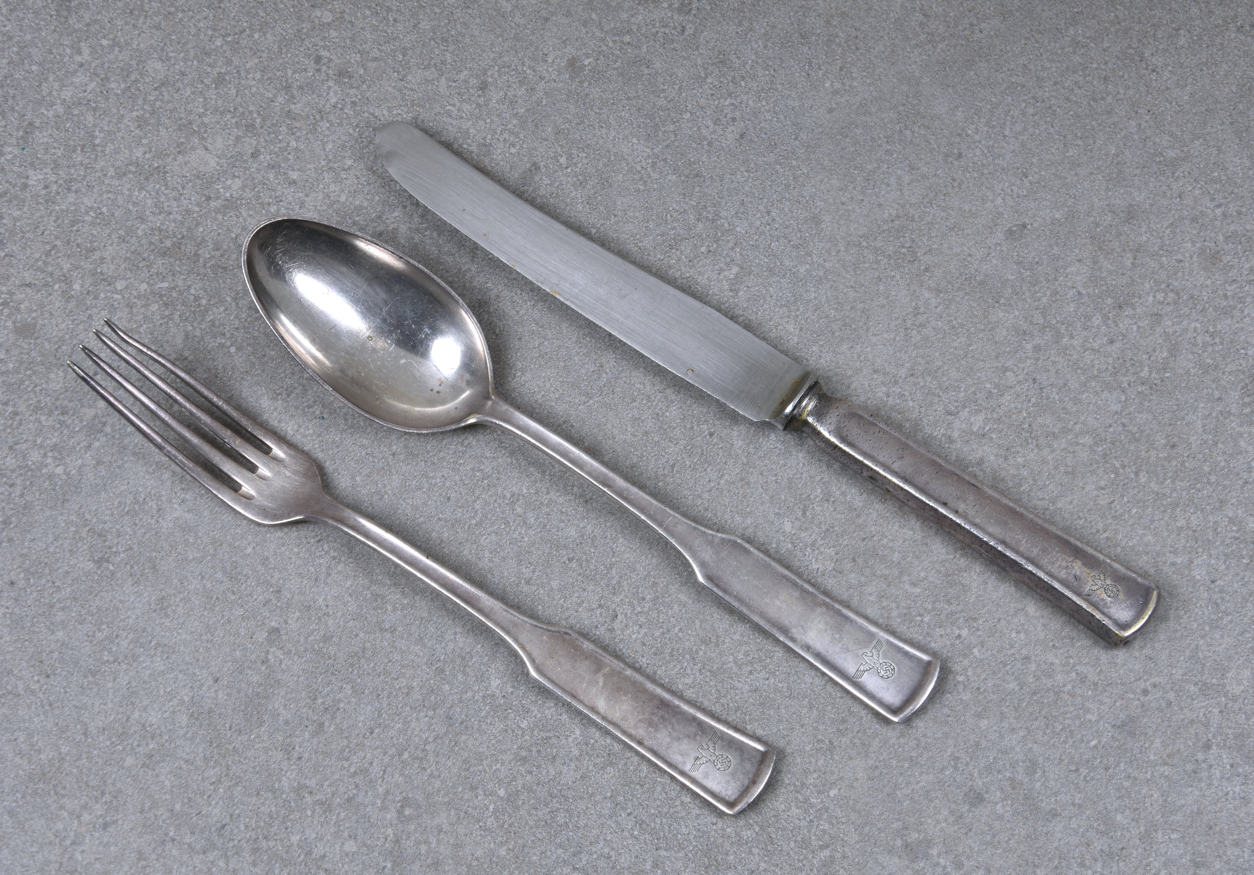 World War Two German interest - A rare silver plate trio of flatware "KANZLEI DES FUHRERS",