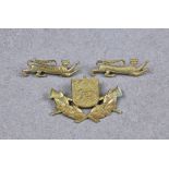 Royal Guernsey Militia Collar Badges, 'elongated lion-leopards', together with a further Guernsey
