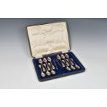 A cased set of twelve George V silver bright cut fiddle pattern teaspoons and tongs, Joseph