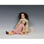 An early 20th Century French SFBJ bisque headed doll, with painted features, 13in., together with
