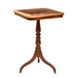 A 19th century mahogany tilt top tripod table, the square top with rounded corners and crossbanding,