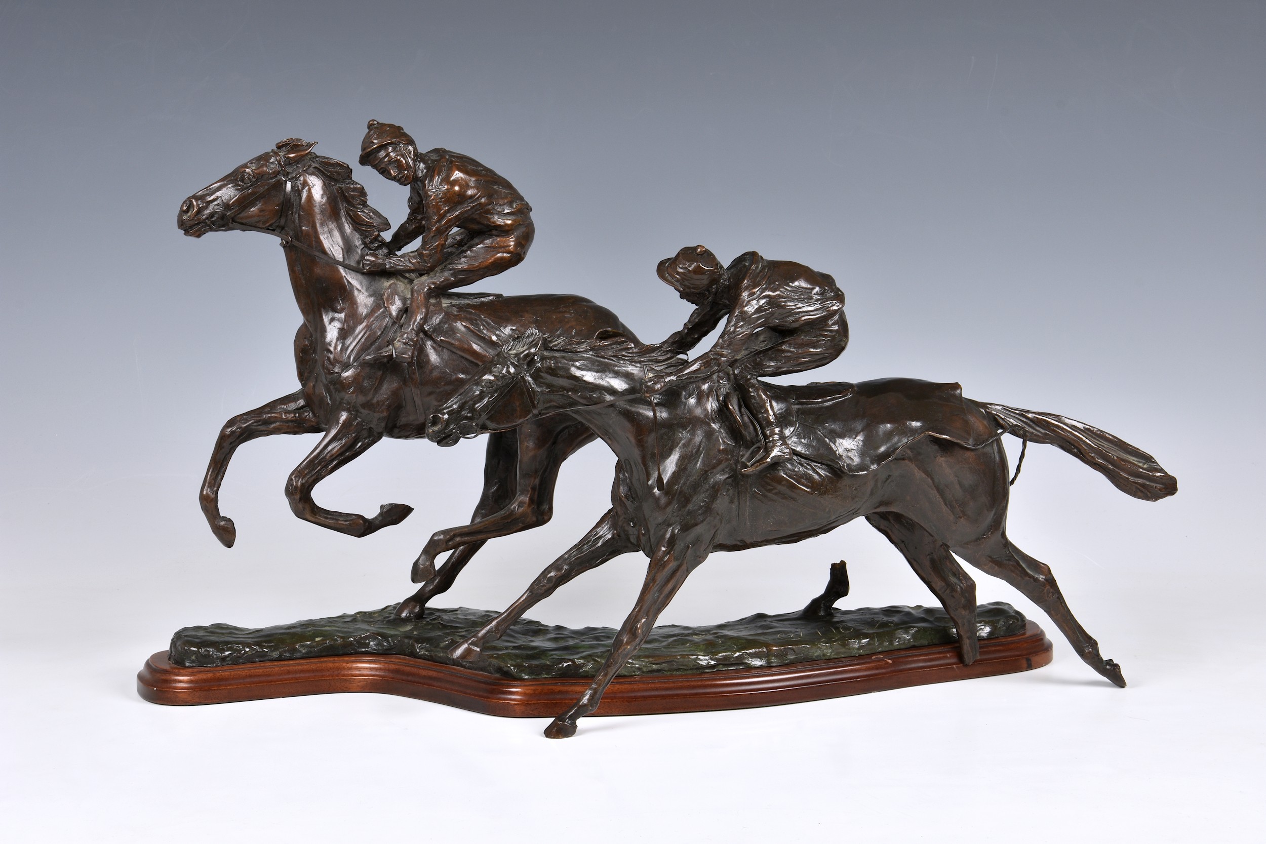 Caroline Wallace (British, 20th century) - a bronze race horse figural group "Fast Work", damaged,