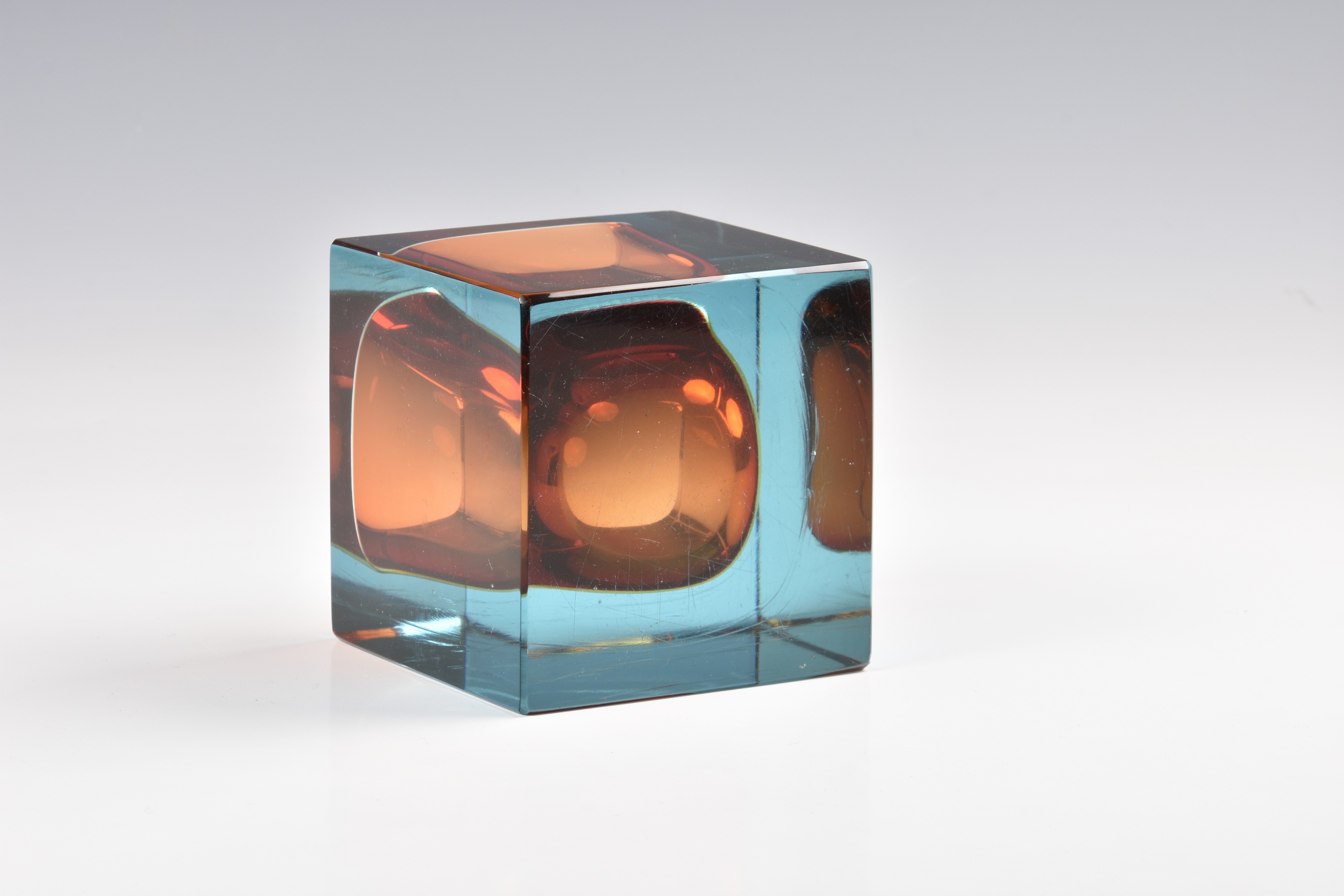 A 1960s square art glass paperweight style vase, in blue and orange, 3¾in. (9.5cm.) high.. * - Image 3 of 4