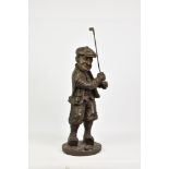 A large cast iron figure of a comical golfer, bronzed finish, holding a club, 34in. (86.4cm.) at