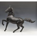 A large Chinese patinated bronze sculpture of a horse / stallion, first half twentieth century,