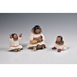 Three C. Alan Johnson Alaska Figurine Collection figures, glazed stoneware figures, comprising