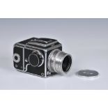 A Hasselblad 1000F Medium Format Body camera, Serial No. CP13833, film magazine, serial No. CP15507,