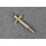 A 9ct gold novelty propelling pencil, in the form of an engine turned cross pendant, no hallmarks,