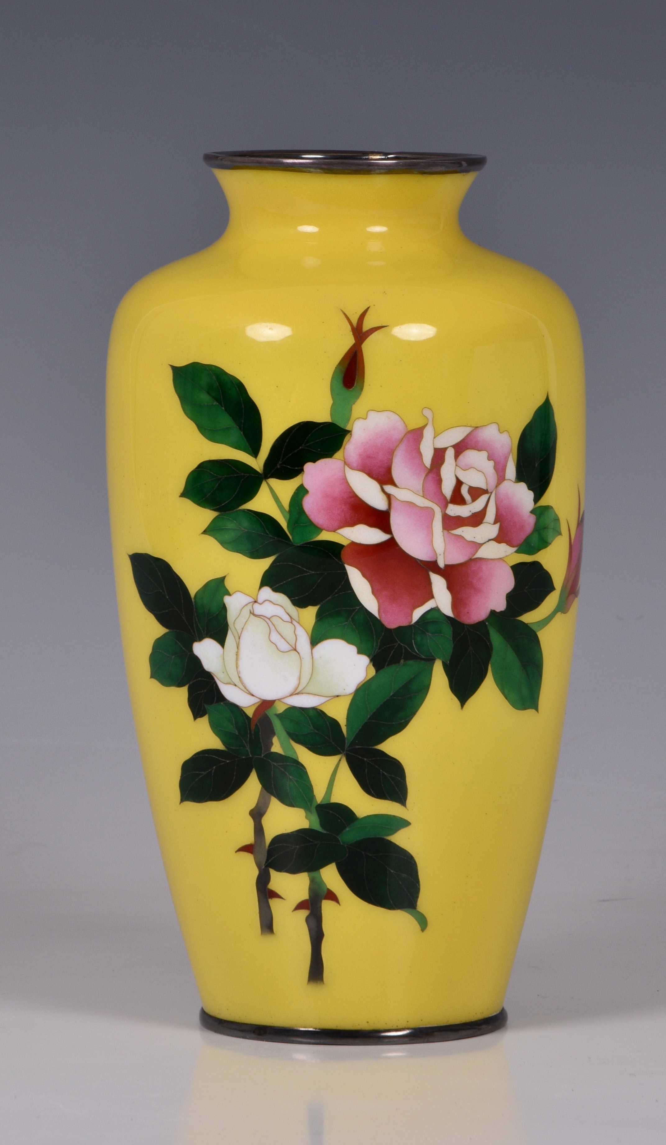 A yellow ground Japanese cloisonné vase, Meiji period, of baluster form with rounded shoulders,