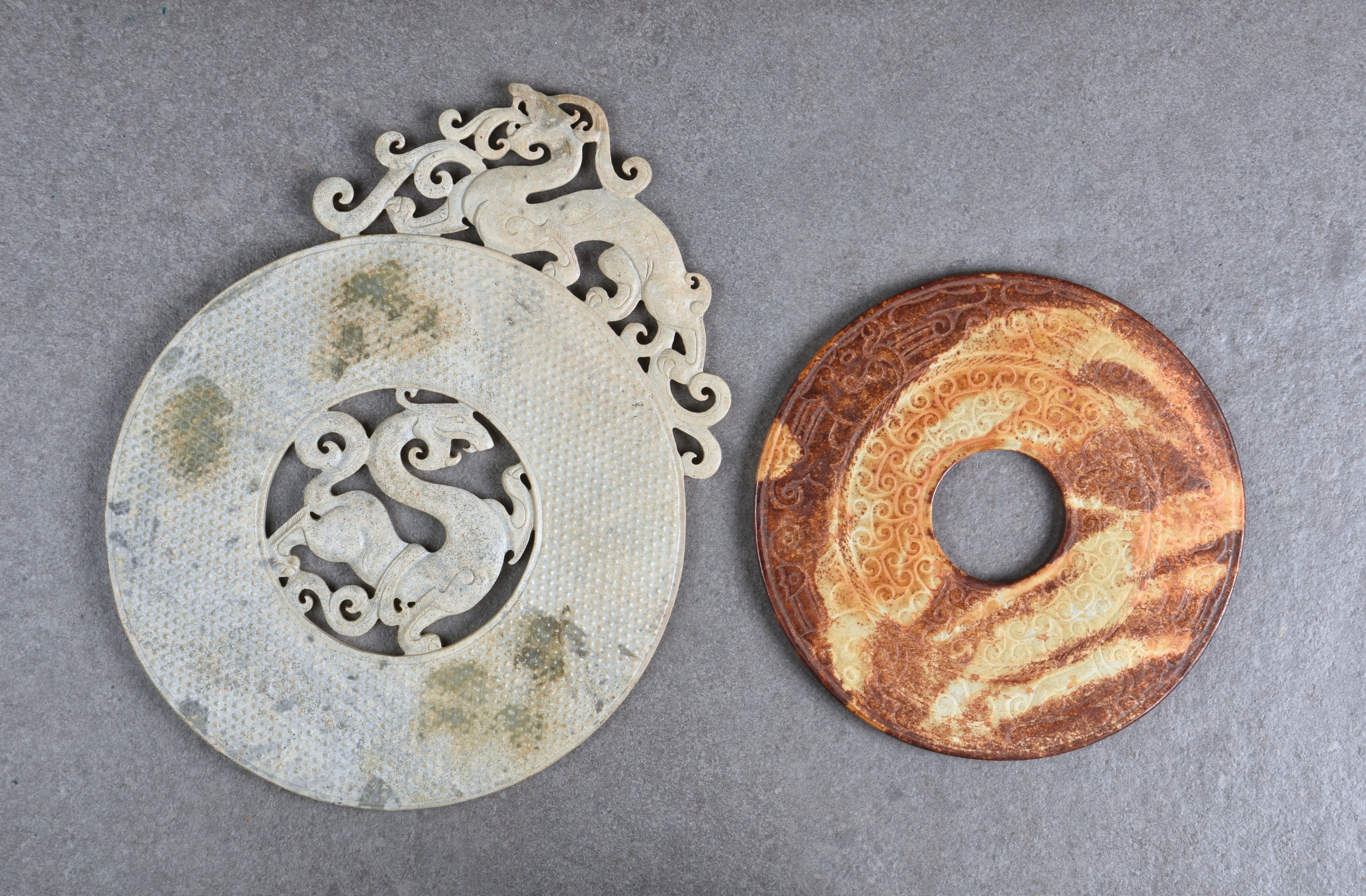 Two large Chinese jade bi-discs, of archaic form, late 20th century, one in celadon jade with - Image 2 of 2