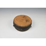 A Japanese Taiko war drum, probably 19th century, the brass rivetted, vellum skins with black