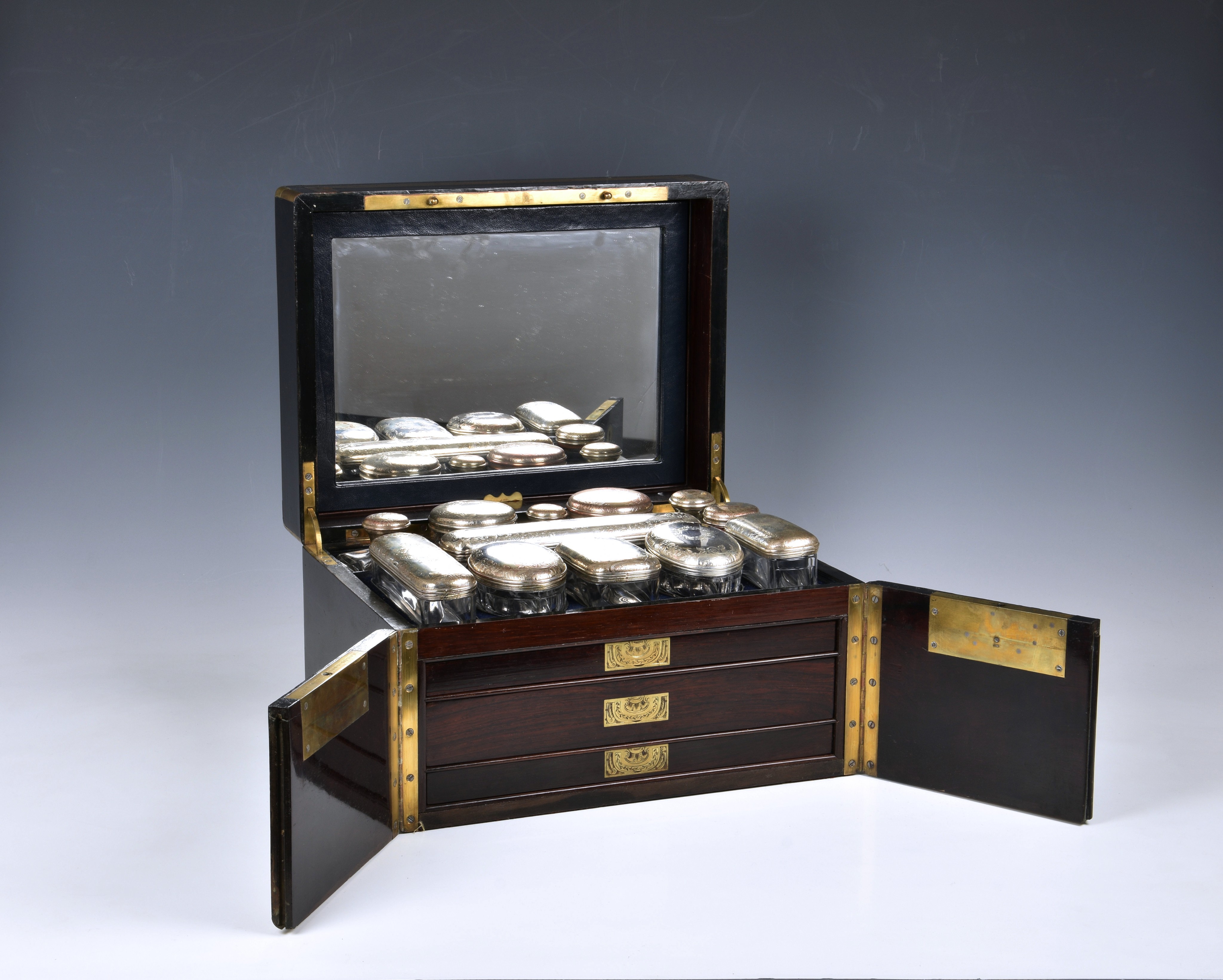 A fine and well fitted 19th century ebonised rosewood Palais Royal travel necessaire / vanity chest,