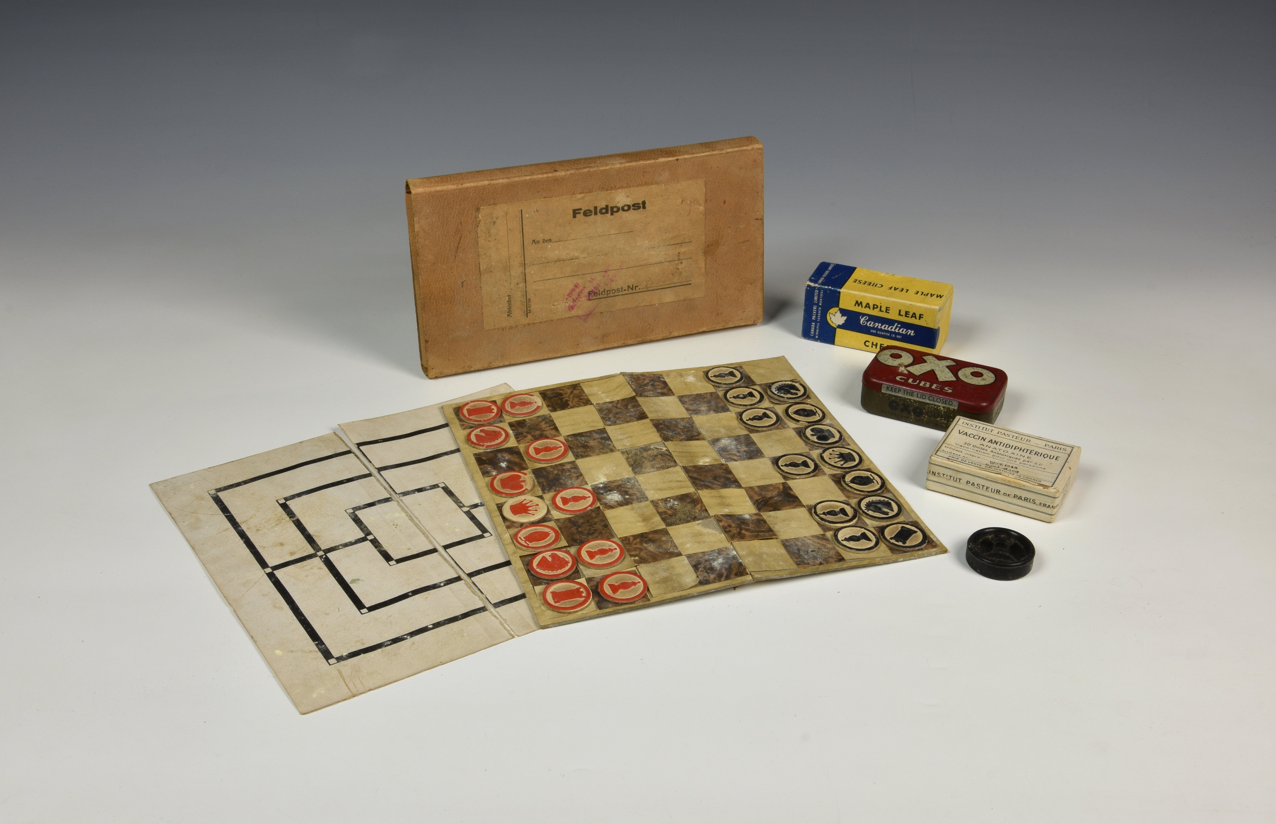 German Occupation of Jersey interest - "Feldpost" labelled chess & draughts game, of card and