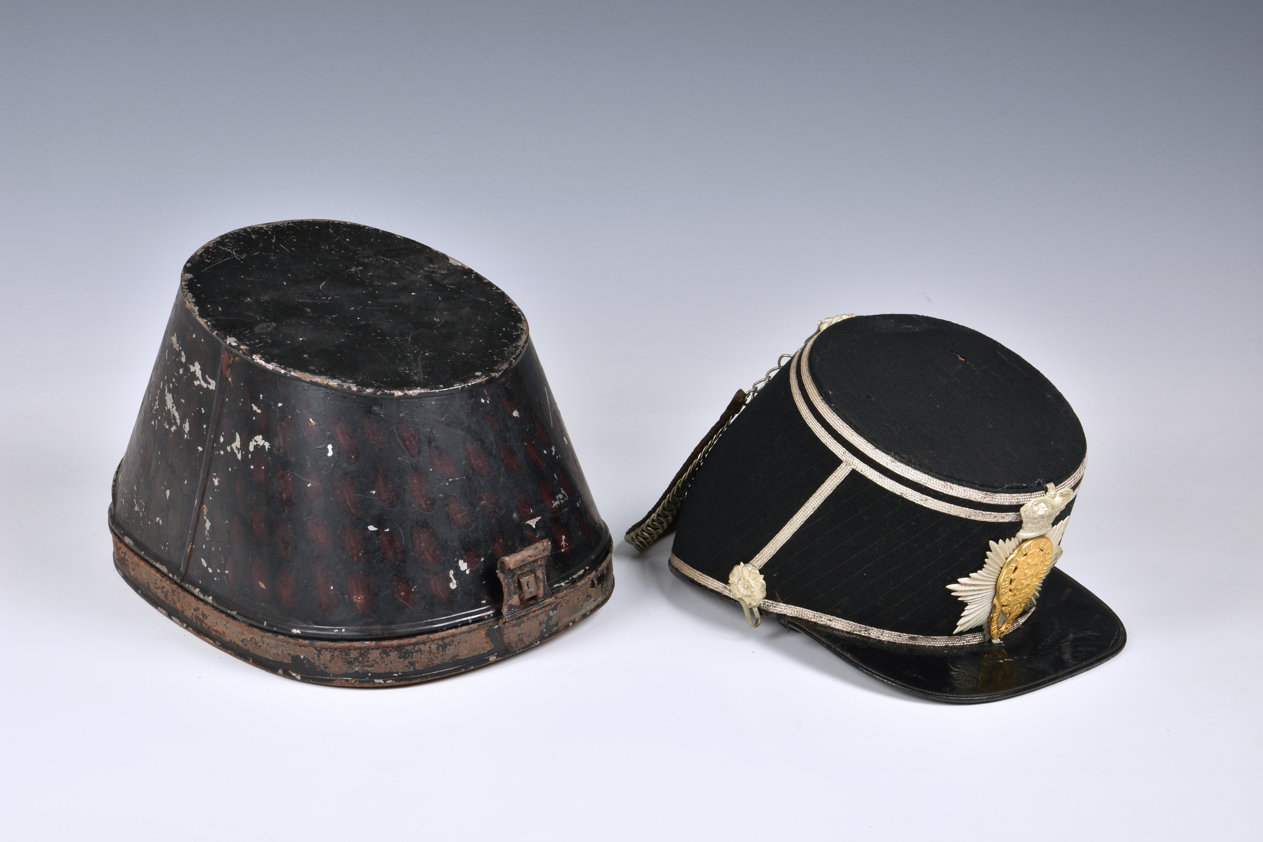 An extremely rare 2nd Royal Guernsey Militia shako, black cloth sides and top, having diagonal