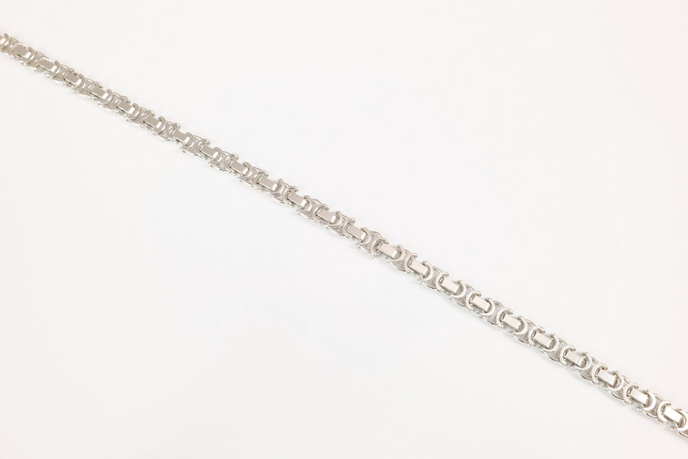 A 9ct white gold fancy link bracelet, approx. 18.2cm long, with lobster clasp.