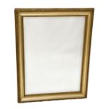 An Edwardian giltwood mirror, with foliate decorated hollow frame, 33½ x 25½in. (85 x 64.75cm.).. *