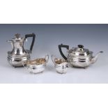 A George V silver four piece tea service, C S Harris & Sons Ltd, London, 1918/19, of bombe form with