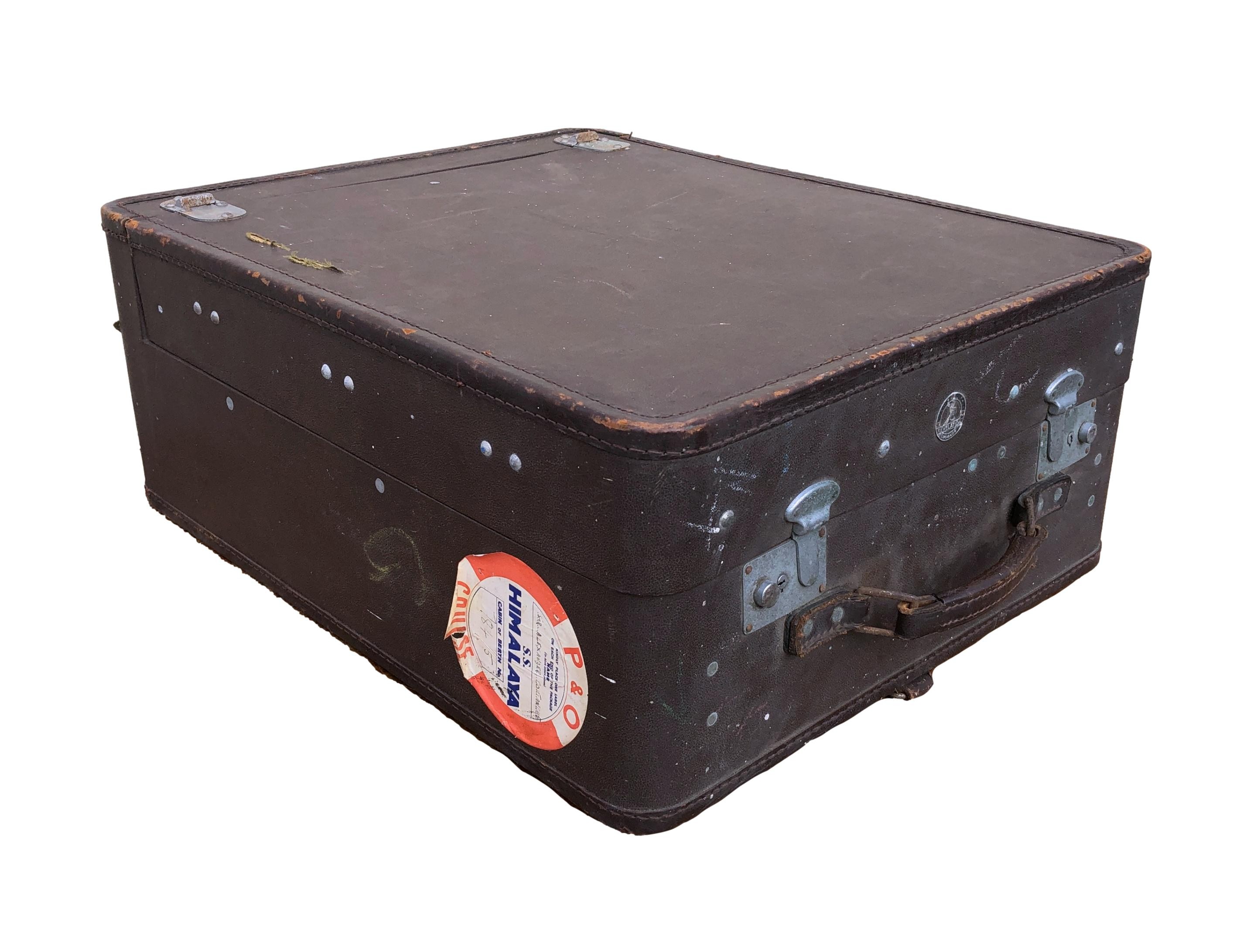 Two vintage mid-century suitcases, comprising a two piece trunk and a Globe Trotter. (2). *