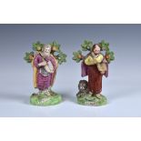 Two Staffordshire 19th century pottery figures of saints, to include 'ST.MARK', standing in front of