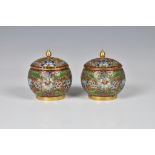 A pair of miniature Chinese gilt metal champleve enamel covered jars, 20th century, of globular