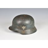 A WWII German Army (Heer) M-35 Double Decal steel combat helmet, greyish-blue, original army