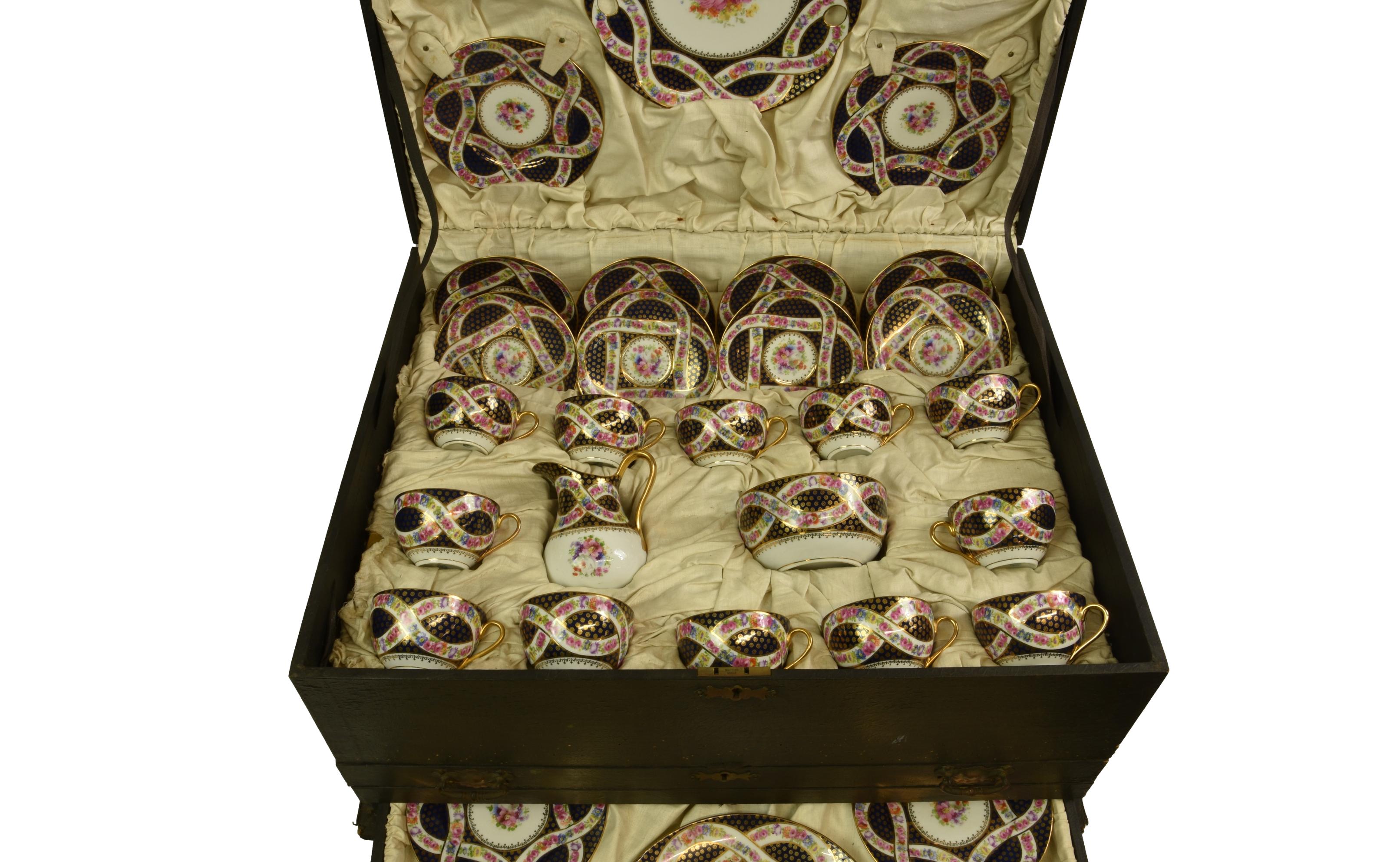 A cased Bohemian porcelain dessert or luncheon service, for twelve settings, each piece centred by a - Image 2 of 3