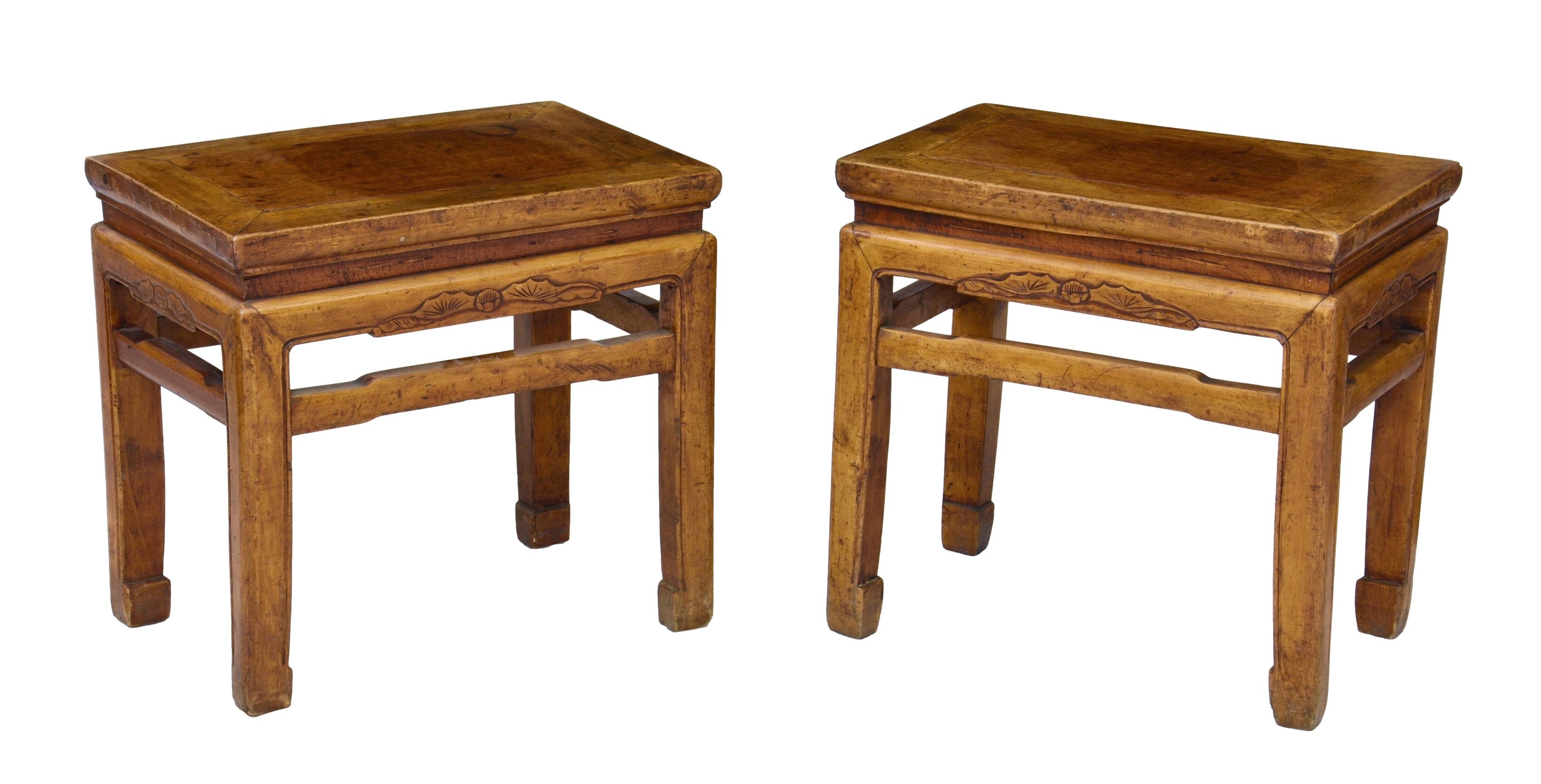 A pair of Chinese yellow hardwood rectangular stands or tables, probably late 19th century, the