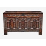 A good early 18th century inlaid joined oak Nonesuch style chest, the three plank top with thumb