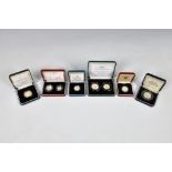 Royal Mint - A collection of boxed Silver Proof coins, comprising a Royal Mint 2001 United Kingdom