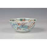 A Chinese porcelain doucai phoenix bowl, four character seal mark, probably 19th century, with