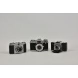 Three Zeiss Ikon cameras, to include Contaflex, serial No. R74079, with Carl Zeiss Tessar 2,8/50