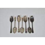 A group of seven Georgian silver Hanoverian pattern dinner spoons, various maker's and dates,