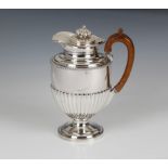 A George III hallmarked silver pedestal coffee pot and cover, William Burwash, London, 1815, of