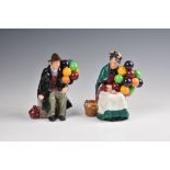 Two Royal Doulton figures: HN 1954 The Balloon Man and HN 1315 The 'Old Balloon' Seller, green