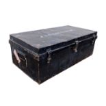 A black tin uniform trunk, early 20th century, inscribed 'J A G Coutanche' for John Alexander Gore