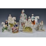 A collection of 19th century and later Staffordshire mostly Military related flatback figures, to