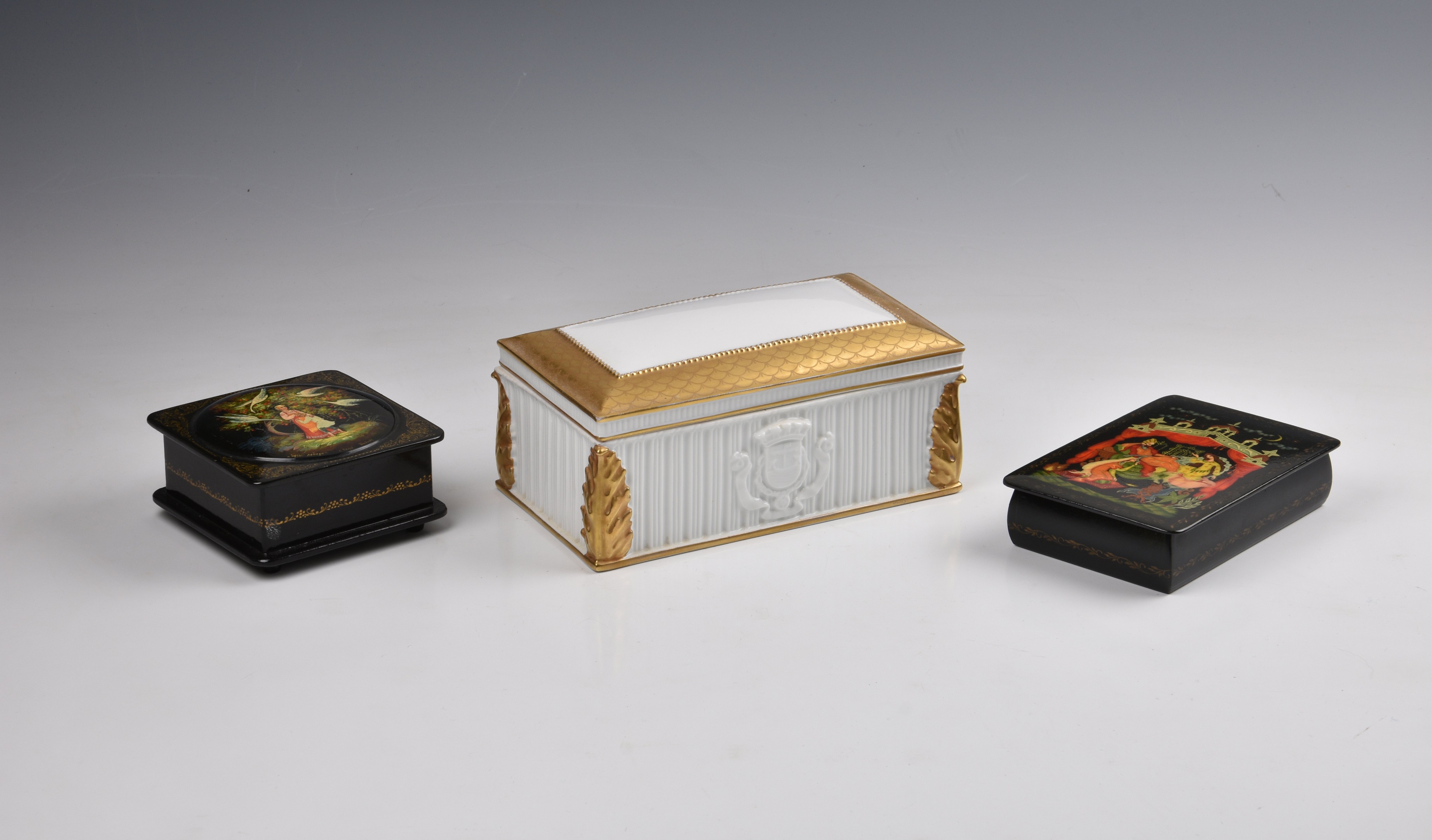 Two Russian black lacquered boxes, late 20th century, one of square form, signed and inscribed, 3½