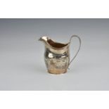 A George III silver helmet shaped cream jug, Peter, Ann & William Bateman, London, 1804, typical