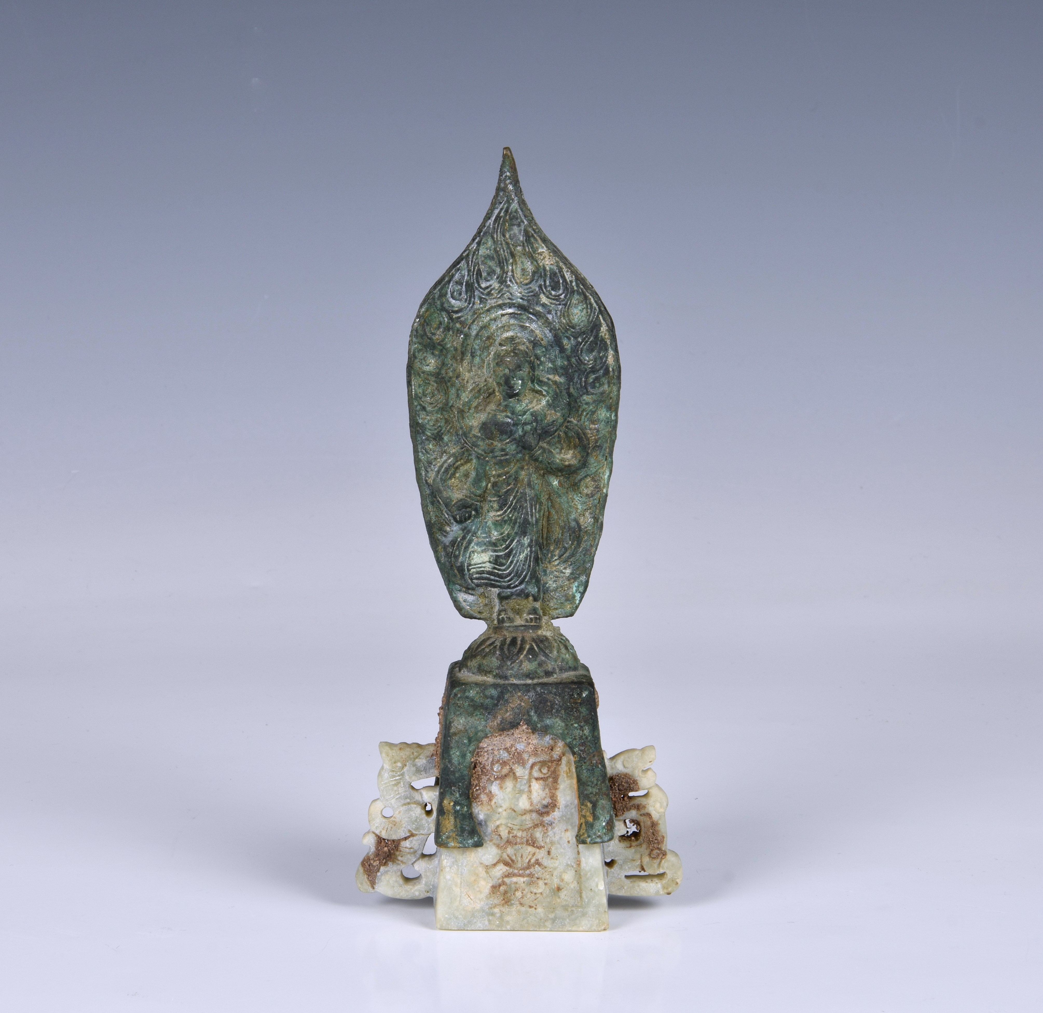 A Chinese bronze and calcified jade Northern Wei figure of Guanyin, probably 20th century, with