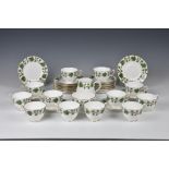 A Crown Staffordshire part tea service, for twelve place settings, in the Green Vine pattern,